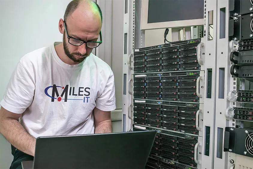 Miles IT specialist supporting a client office