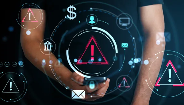 Man holding smartphone with glowing alert icons and digital interface, concept of cybersecurity threat