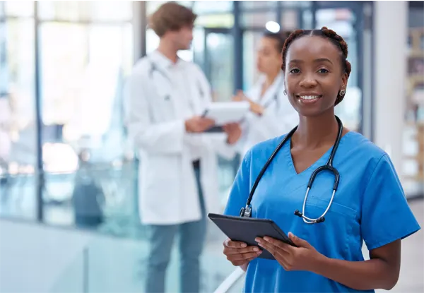 Healthcare worker analyzing test results on a tablet