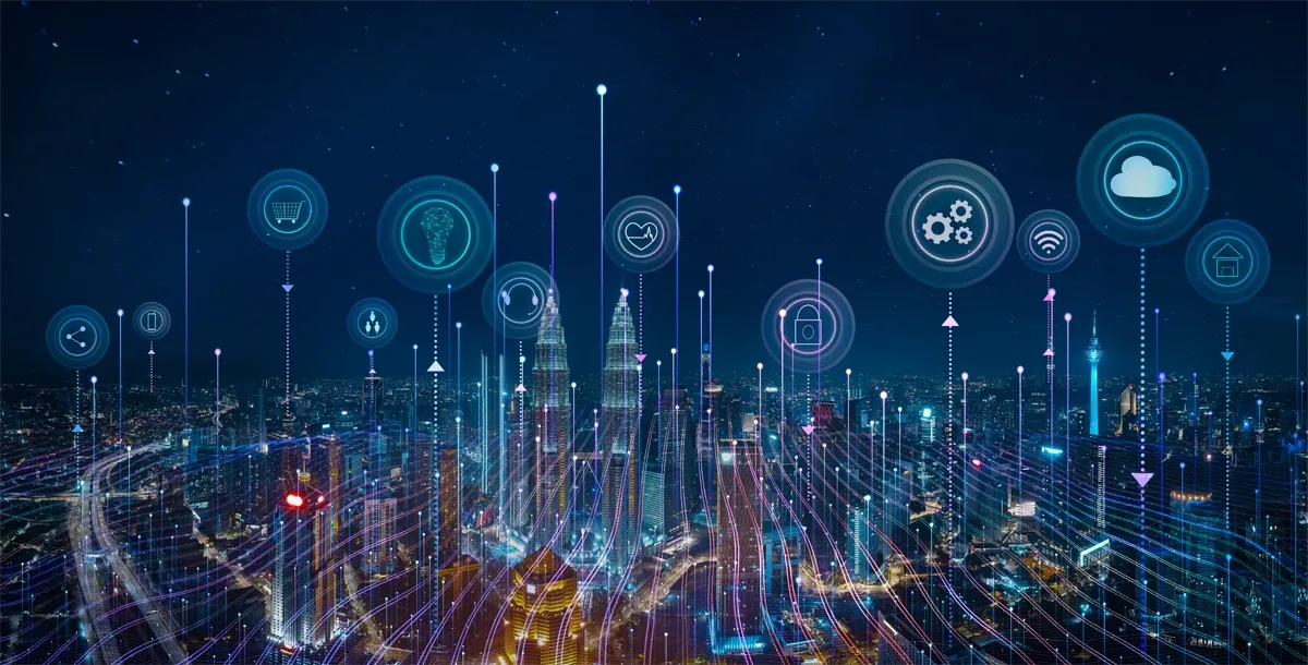 Panorama aerial view of a cityscape skyline with smart services and icons, internet of things, networks and augmented reality concept, night scene.