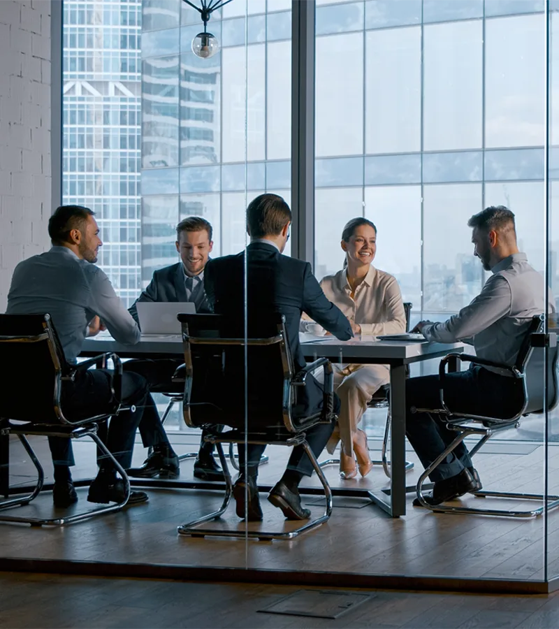Business partners working together after a presentation